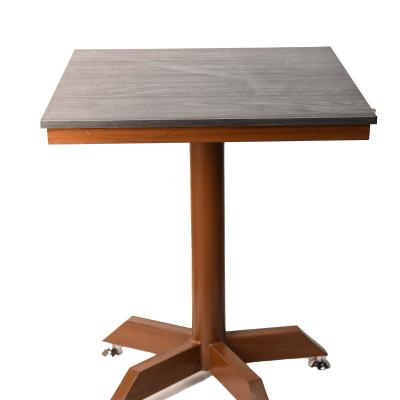Square dining table with a modern wooden touch