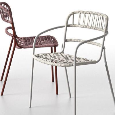 Two outdoor chairs with a woven design and two different colors